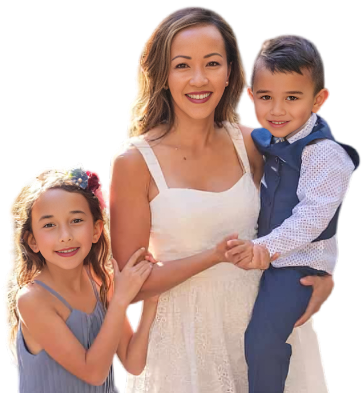 Dr. Trang Cao, expert orthodontist from Bold Bite Orthodontics in Jacksonville FL, poses with two children outdoors.